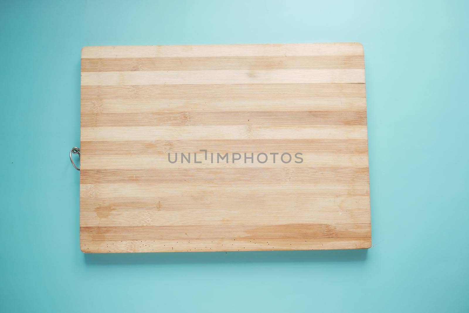 wooden chopping board on table top down .