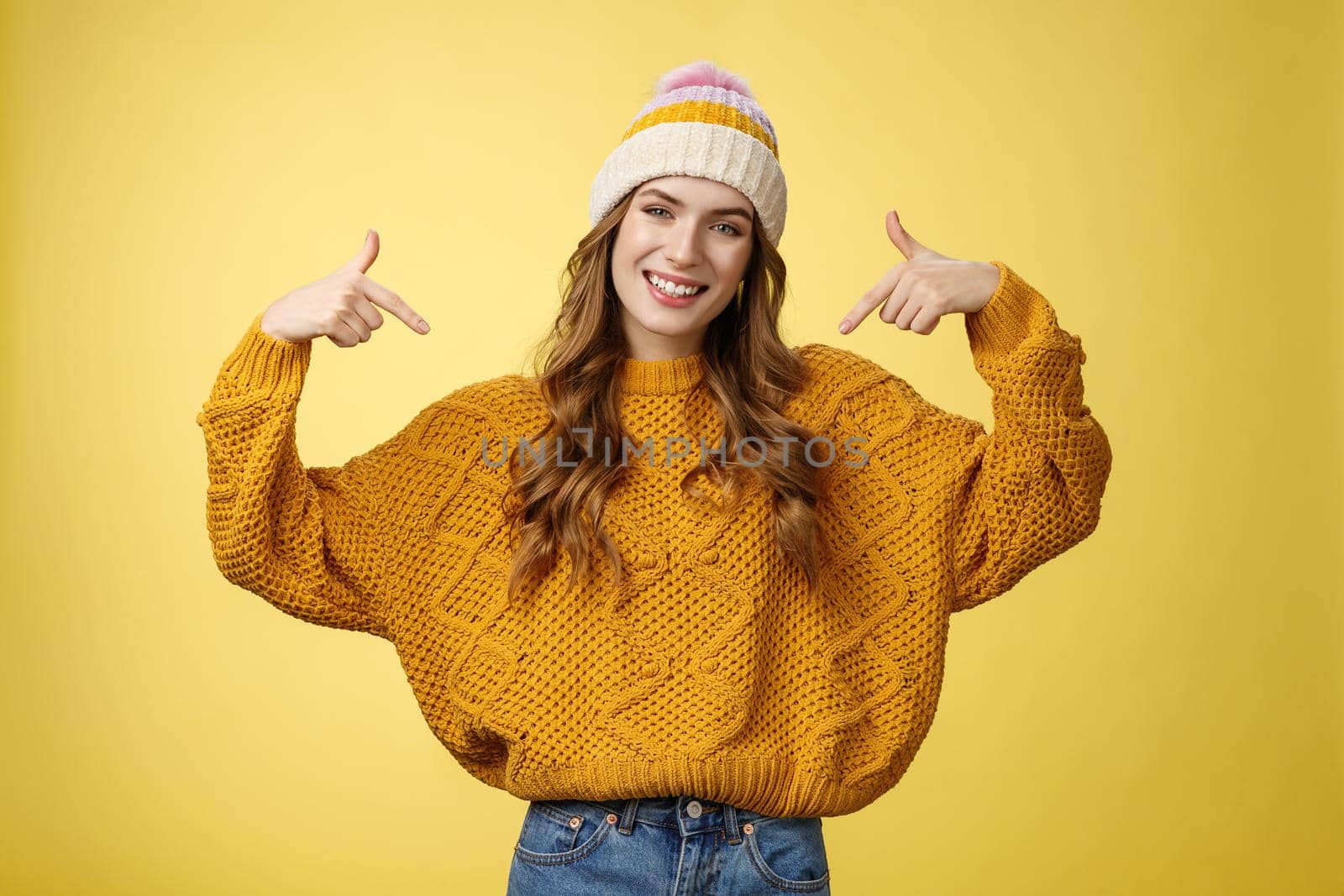 Stylish confident satisfied good-looking young woman winner bragging her achivement goals pointing shoulders smiling delighted telling you she perfect candidate, suggesting herself. Copy space