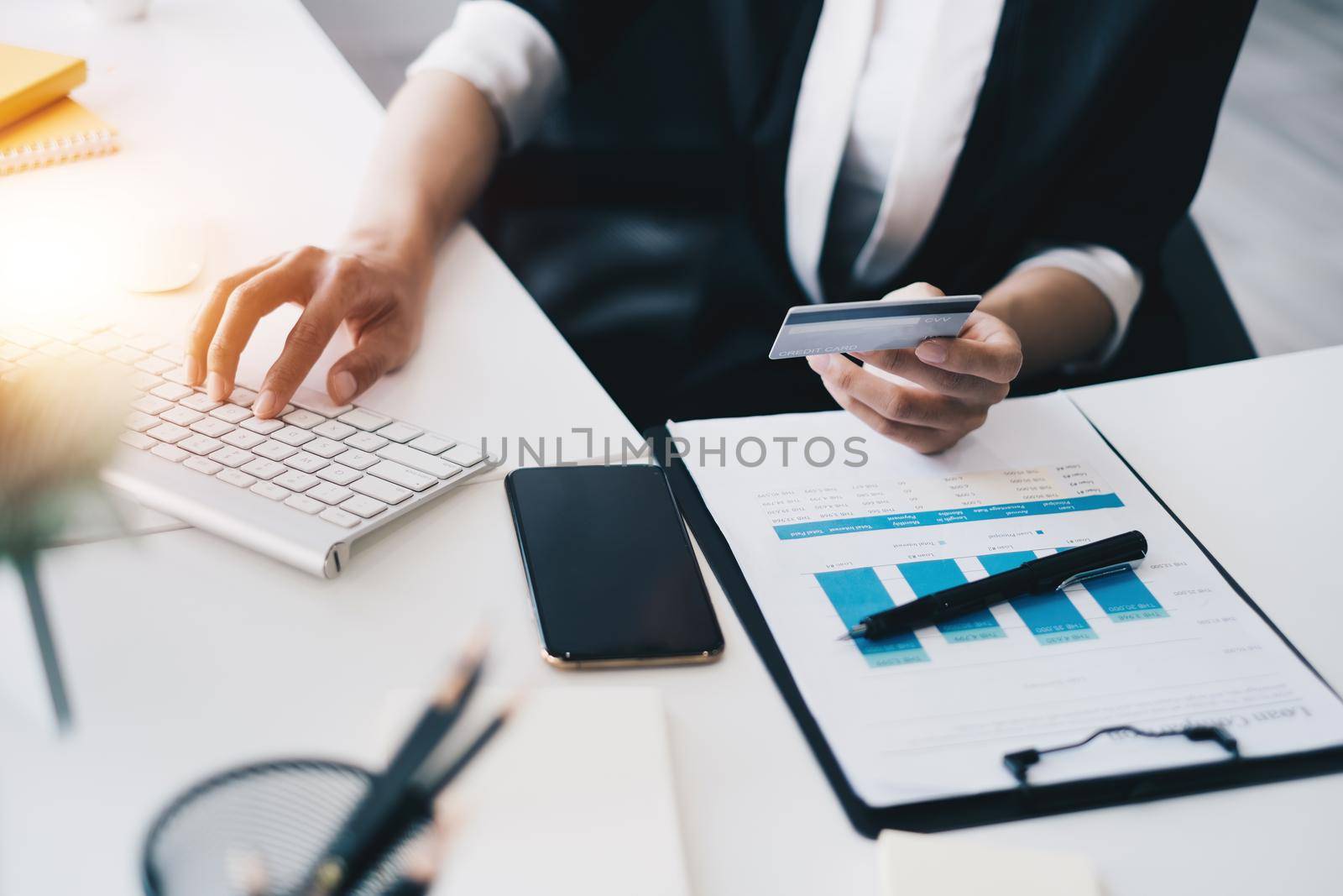 Woman enjoy with online shopping application and typing credit card for fill number to payment with virtual digital asset and metaverse icon on screen