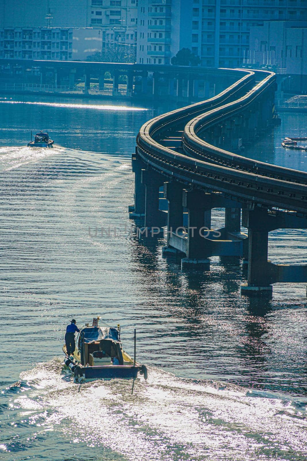 Cityscape of ships and Shinagawa Wards (Keihin Canal). Shooting Location: Tokyo metropolitan area