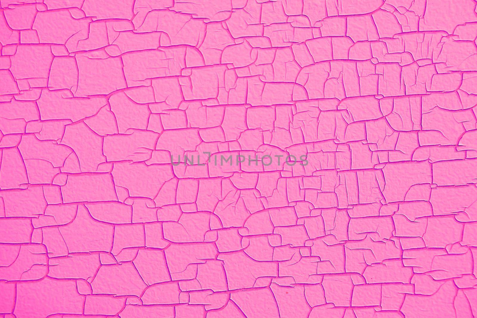 pink wood texture surface is glow pink color cracked and swelling, from the temperature of the heat from the sunlight that shines for a long time