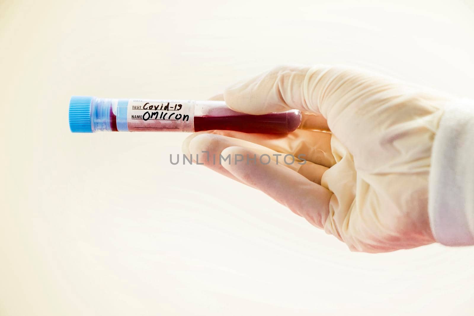 Omicron, corona virus variation. Corona virus blood test tubes on the white background
