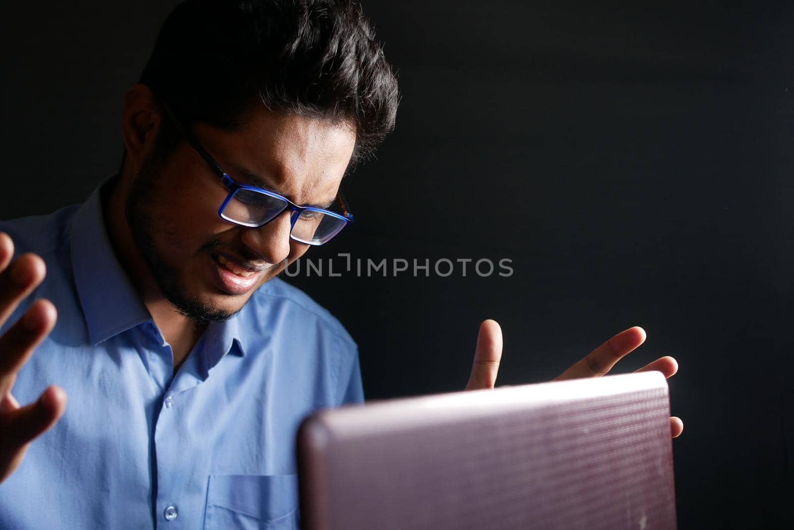 Depressed man feeling sick and worried about financial problem.