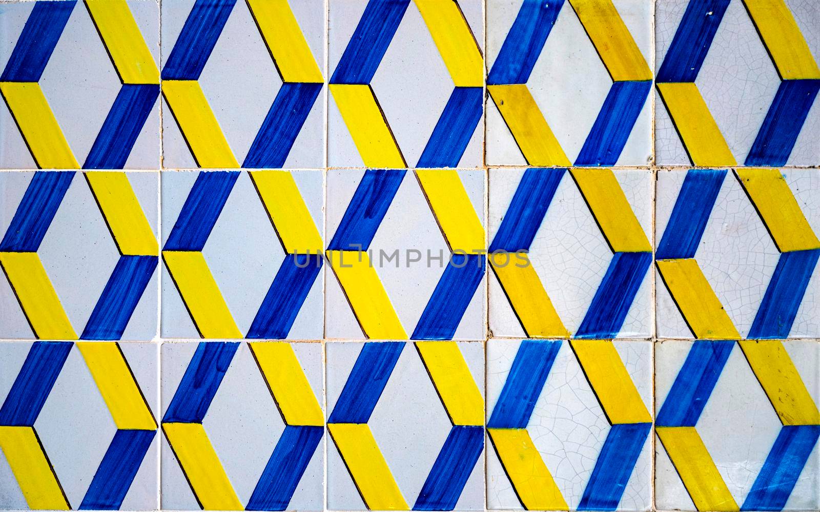 Close up of colorful Portuguese Azulejos (ceramic tiles) on a wall in Lisbon by raferto1973