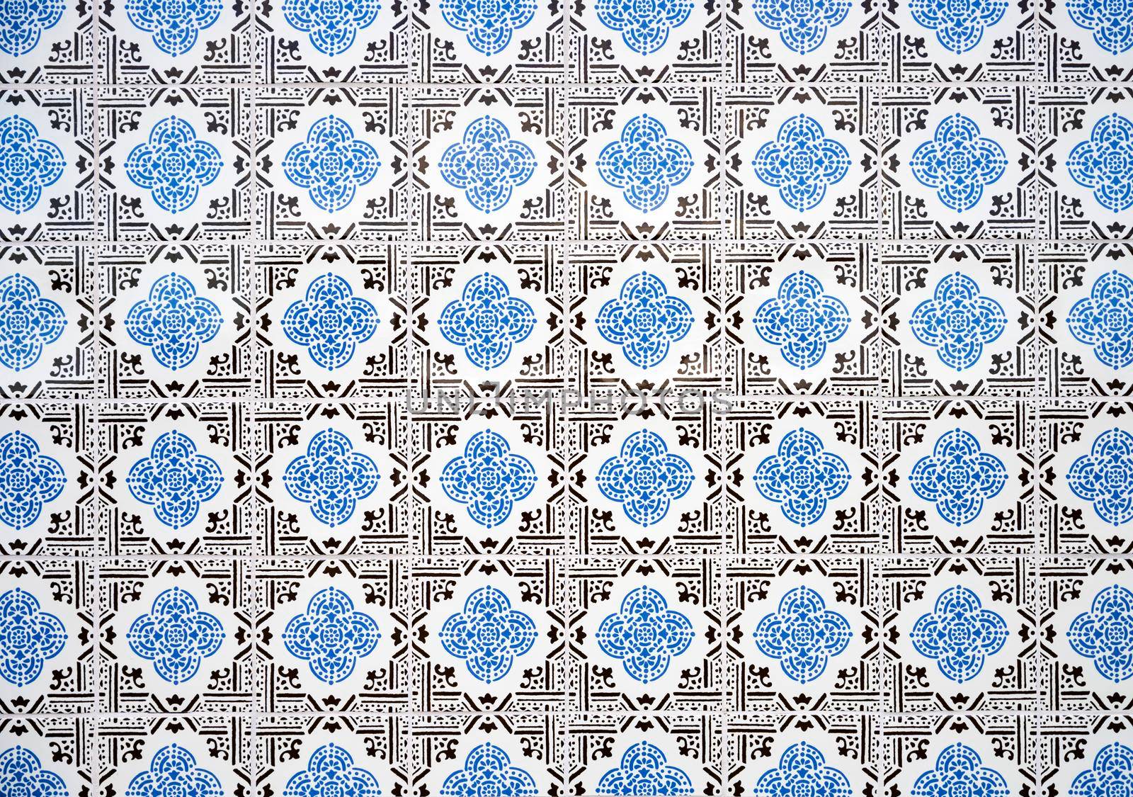 Azulejo is a form of Portuguese and Spanish painted tin-glazed ceramic tilework. Found on the interior and exterior of churches, palaces, houses, schools, restaurants and railway stations. They are an ornamental art form, but also had a specific functional capacity like temperature control in homes.