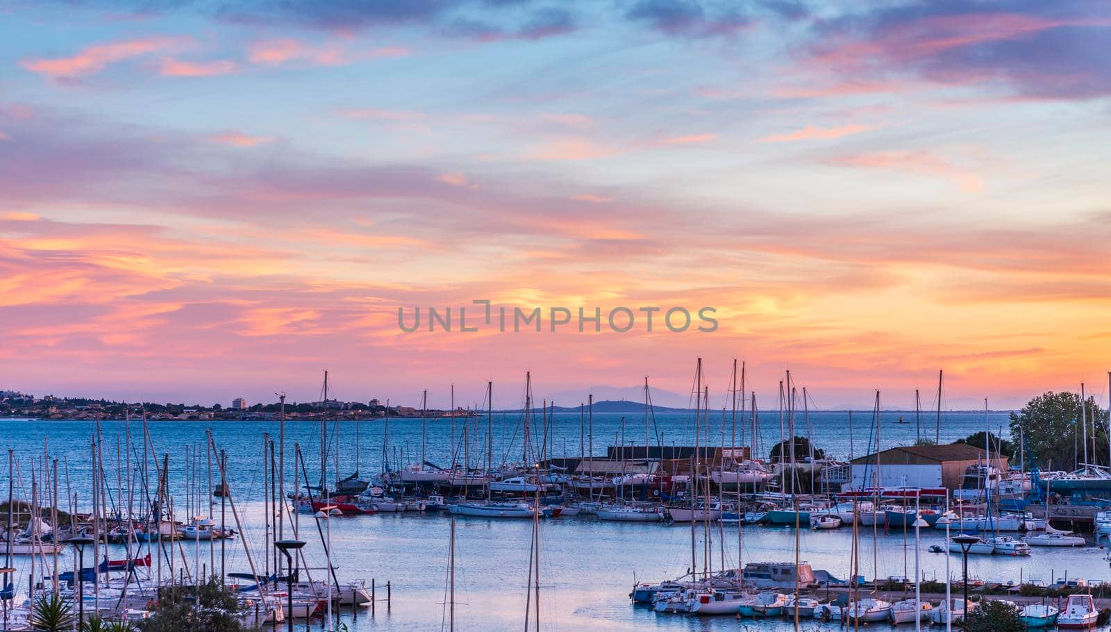 Dusk over the Thau lagoon at Balaruc in Occitanie, France by Frederic