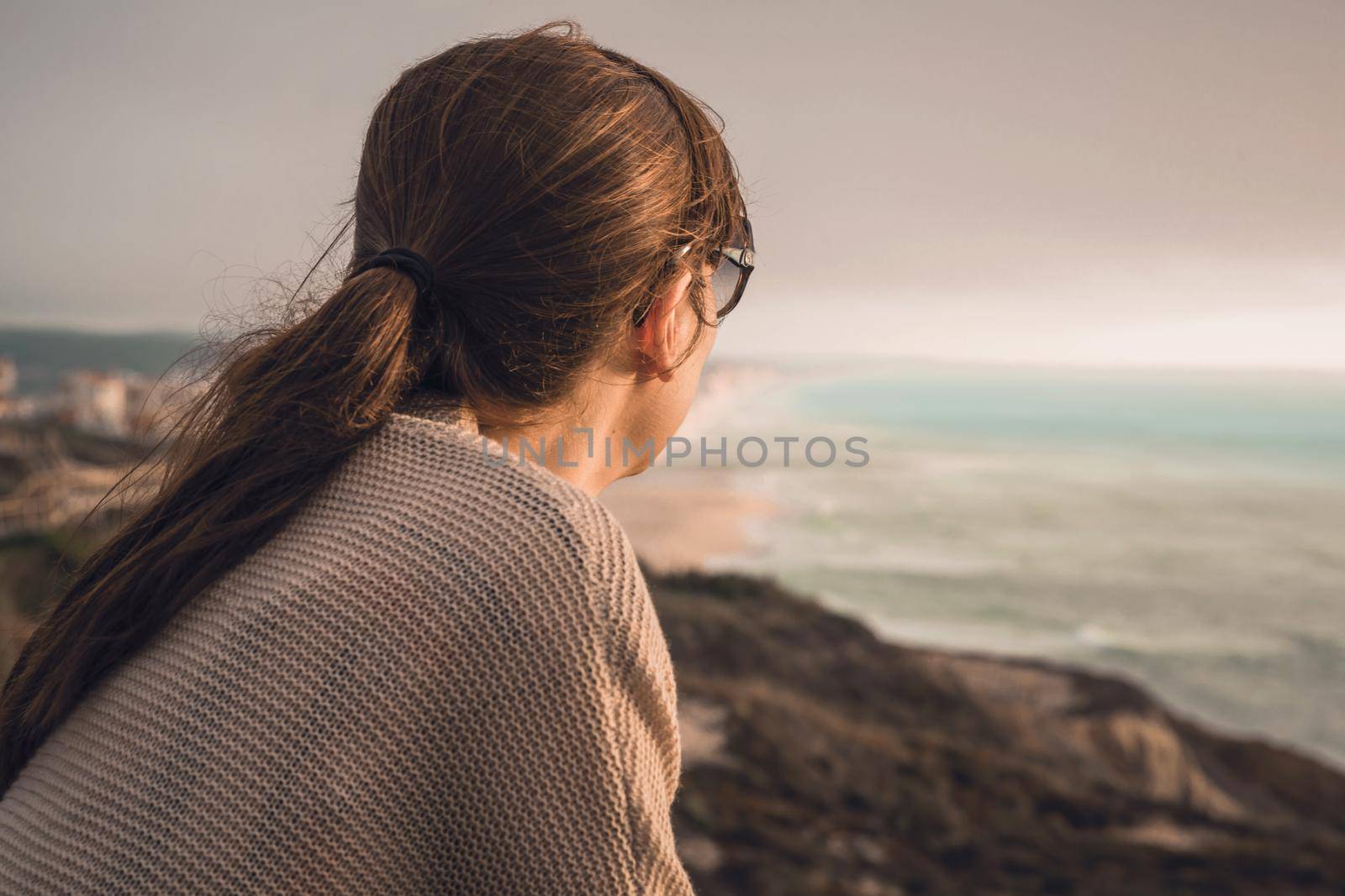 Woman alone lost in her thoughts