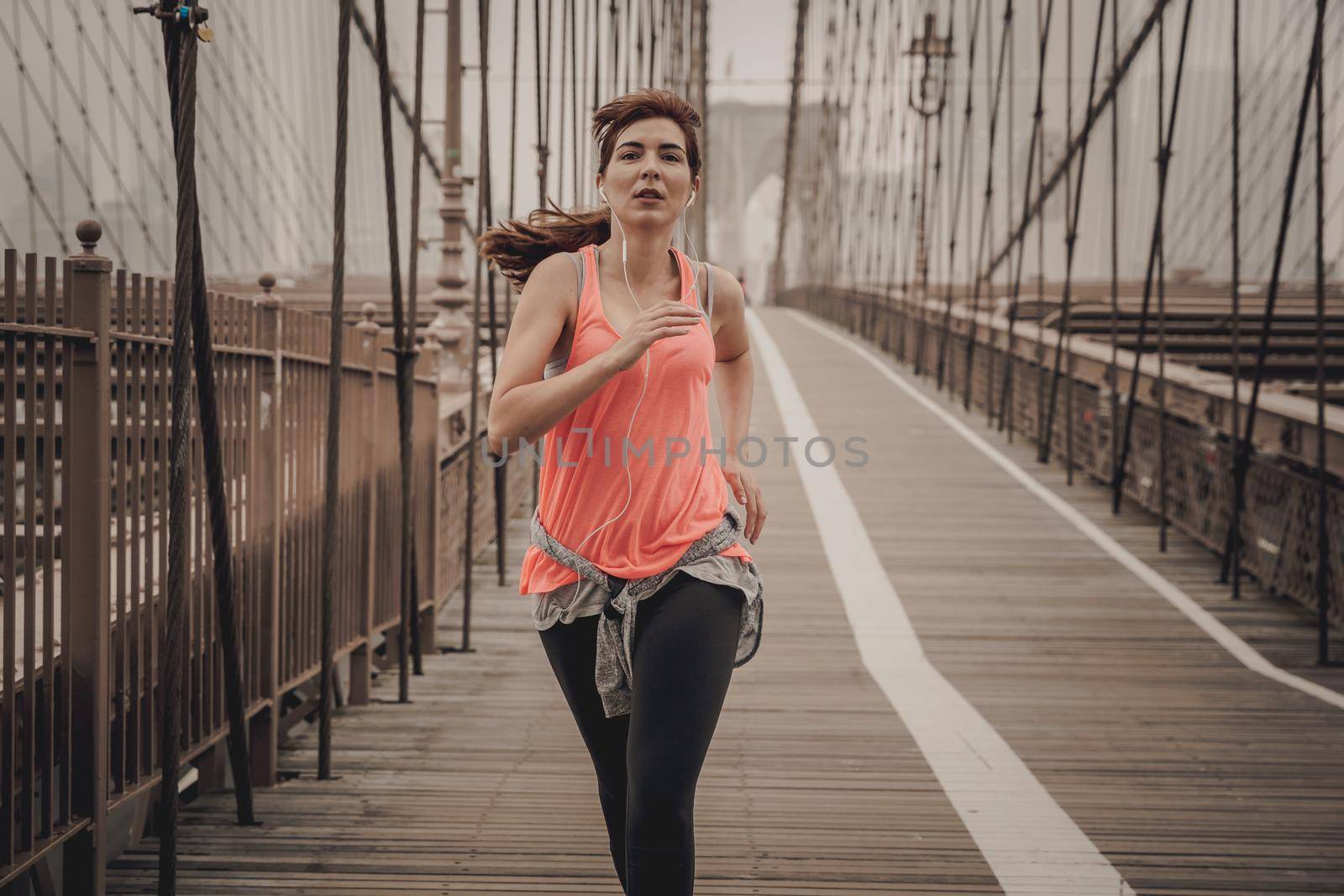 Running on Brooklyn bridge, NYC by Iko