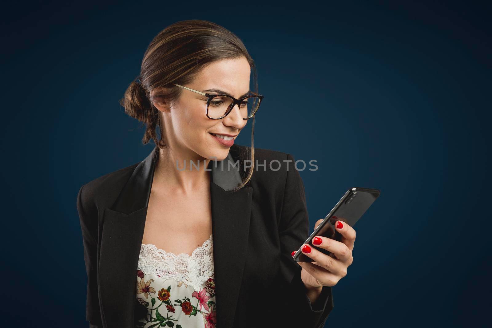 Beautiful woman checking her cellphone