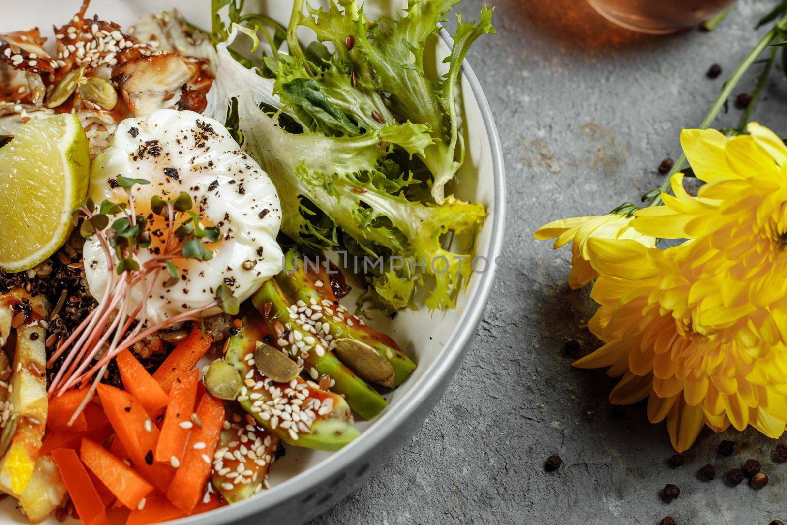 Healthy bowl - quinoa salad with tuna, broccoli, avocado on wooden rustic table. top view by UcheaD