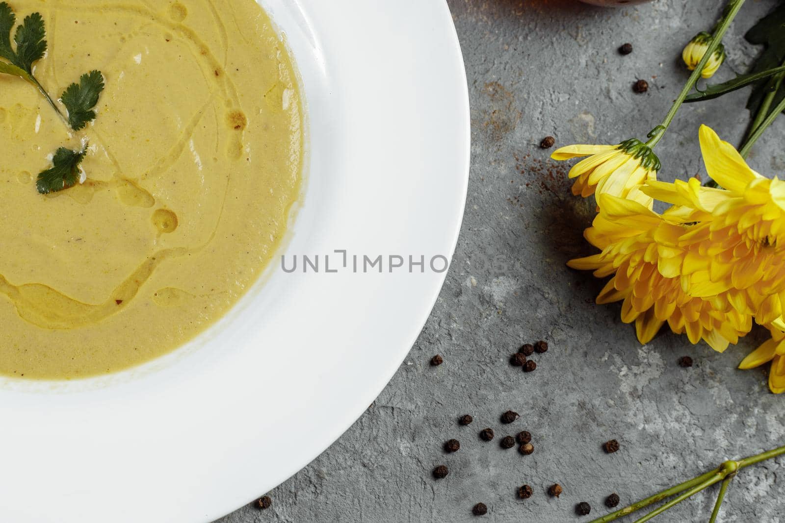 Delicious cream soup with bread on the table by UcheaD