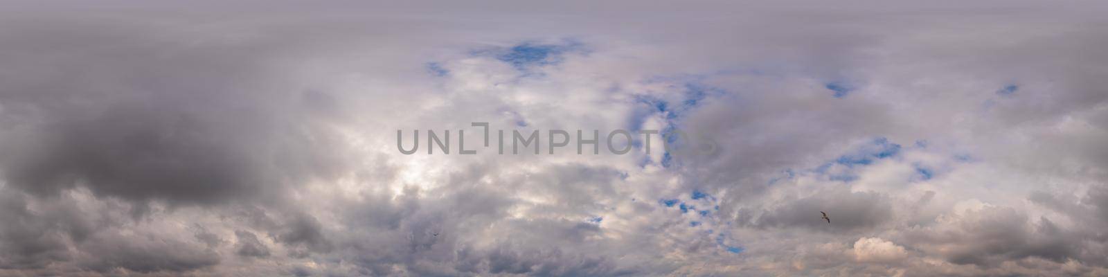 Overcast sky panorama on sunset with Cumulus clouds in Seamless spherical equirectangular format as full zenith for use in 3D graphics, game and aerial drone 360 degree panoramas for sky replacement