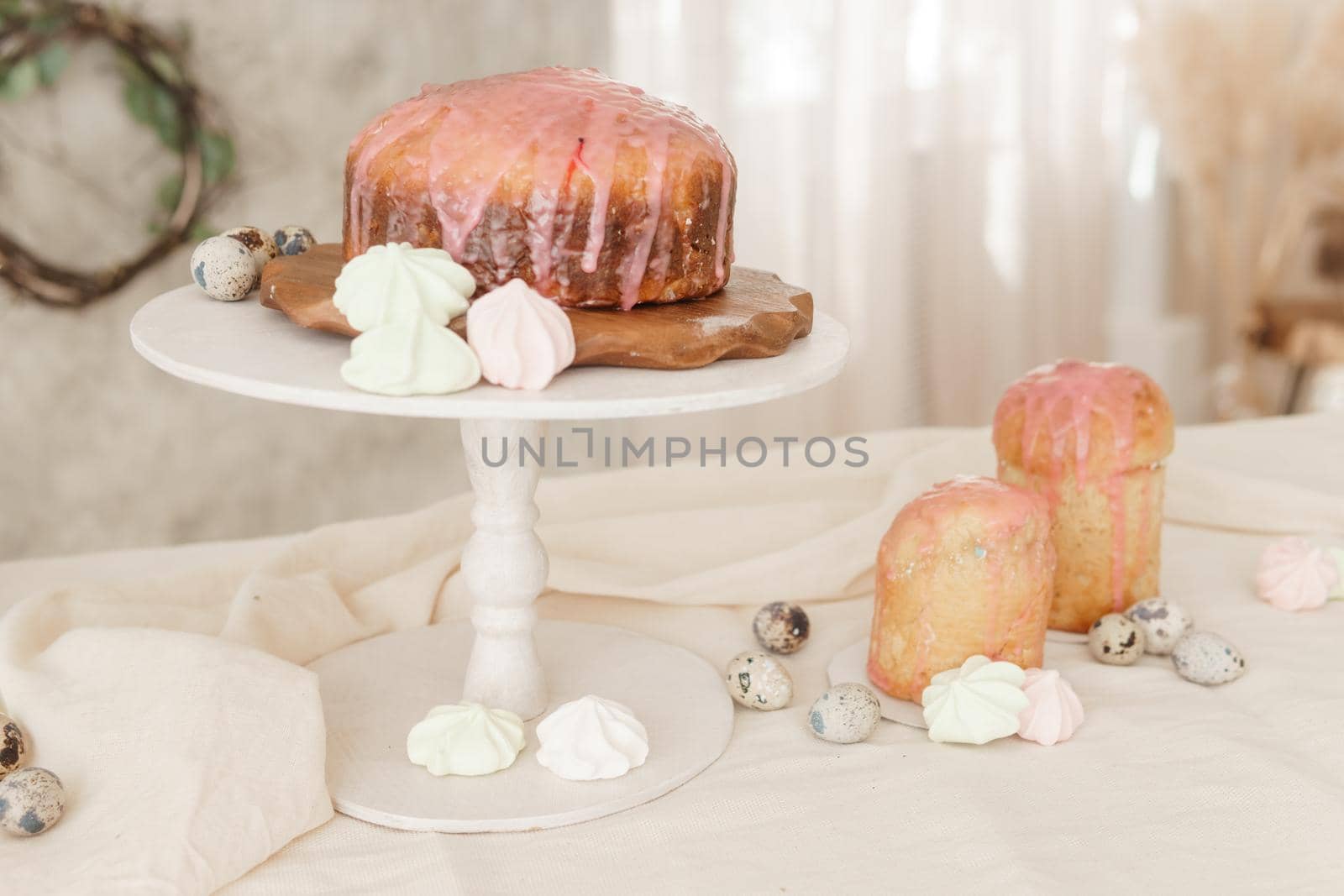 A set table for the celebration of Easter. Cakes and quail eggs on the Easter table. Happy Easter.