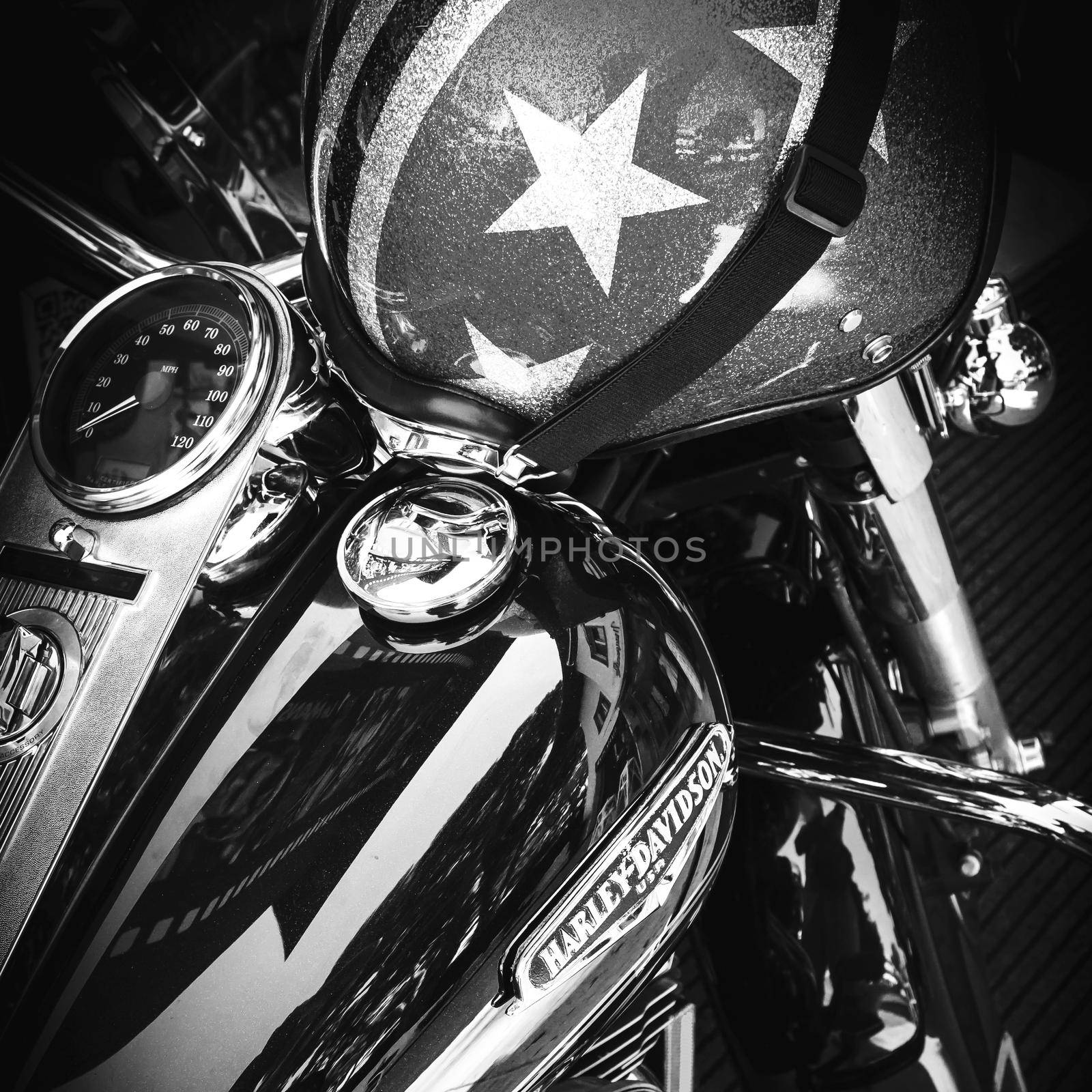 Logo of Harley Davidson motorcycles on a tank and italian helmet. Jesolo (VE), ITALY - July 29, 2017.