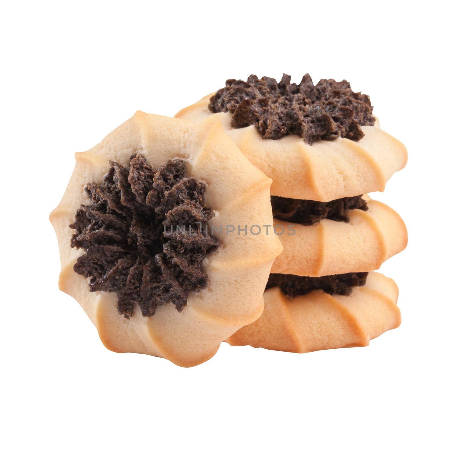 Closeup of appetizing swirl shaped shortbread biscuits with center of chocolate dough stacked isolated on white background. Delicious natural cookies