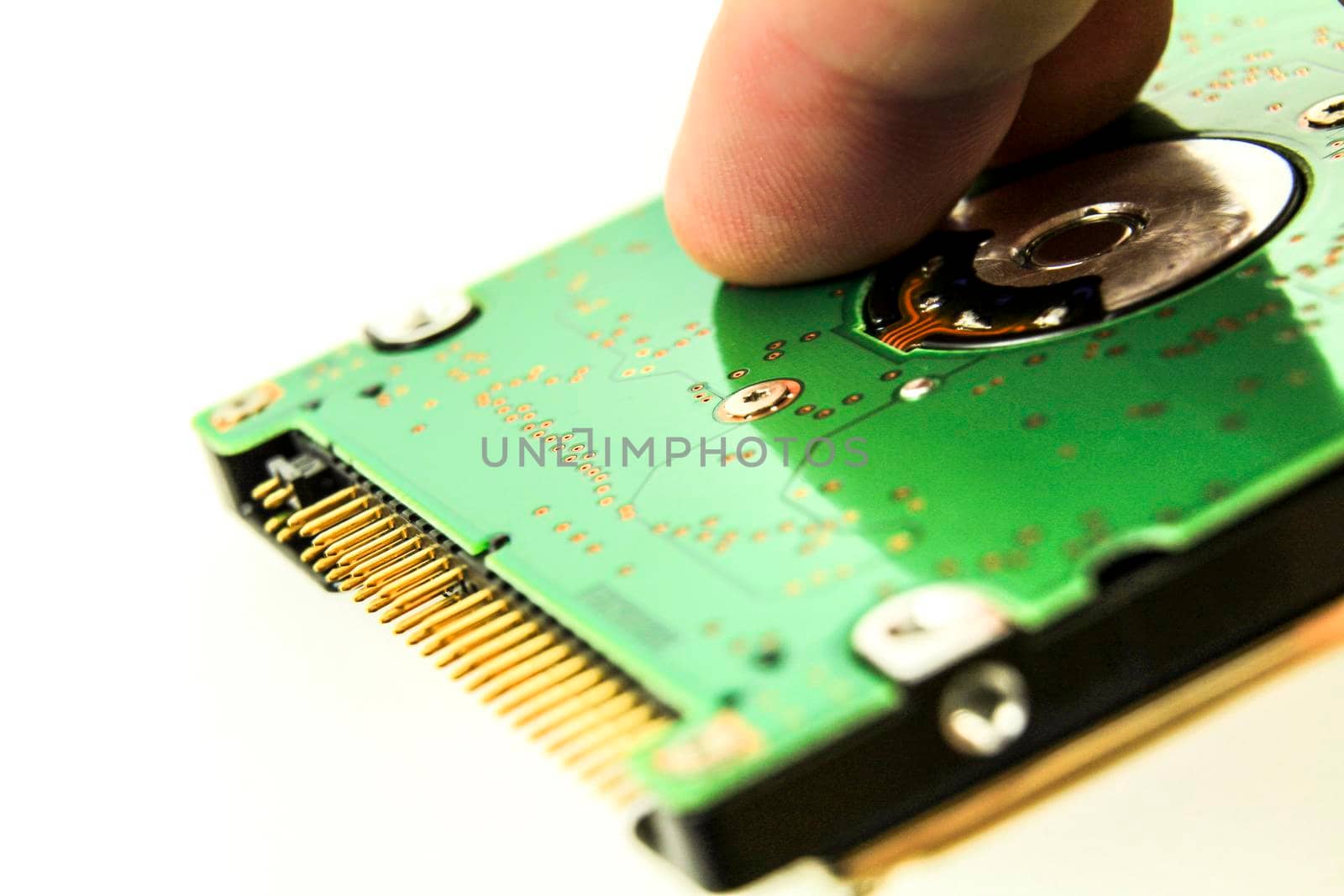 Old and vintage IDE/ATA hard disk on white background