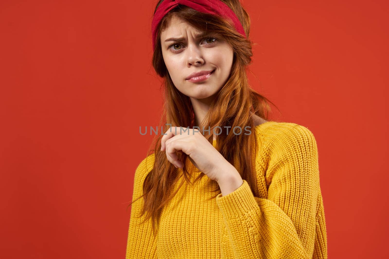 woman in yellow sweater with red headband fashion by SHOTPRIME