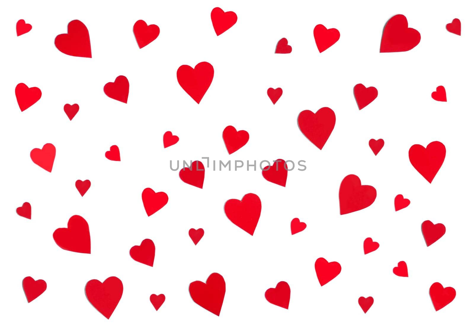 Red paper hearts pattern isolated on white background. St Valentines Day, love, tenderness, care and friendship concept. Abstract wallpaper