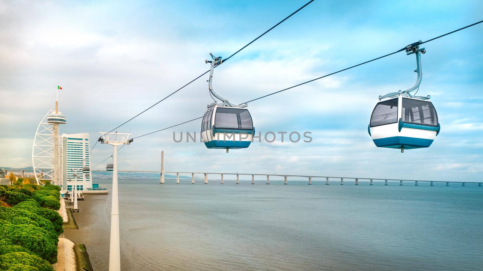 Aerial photo of cable car and Vasco da Gama tower. Sightseeing in Lisbon, Portugal. by DariaKulkova