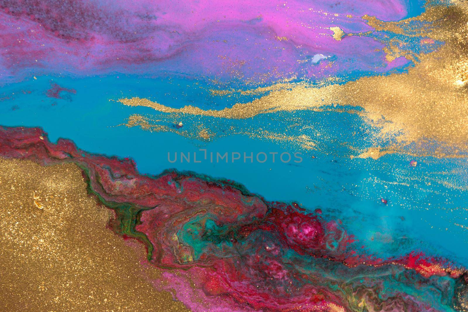 Abstract fluorescent ink liquid mix with gold dust