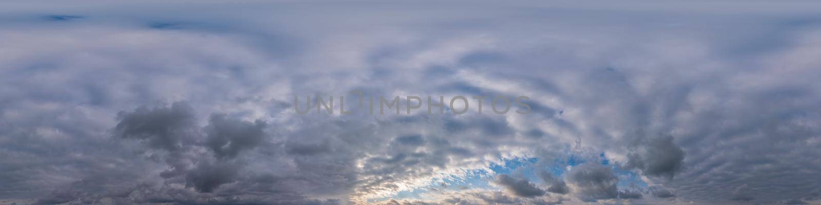 Overcast sky panorama on sunset with Cumulus clouds in Seamless spherical equirectangular format as full zenith for use in 3D graphics, game and aerial drone 360 degree panoramas for sky replacement