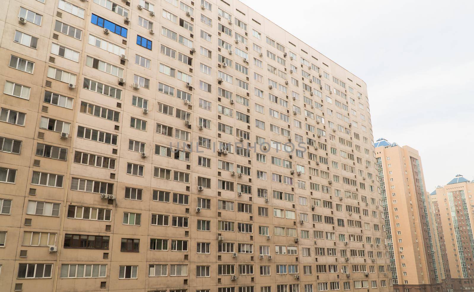 Facade of a modern multi storey residential complex. Urban architecture