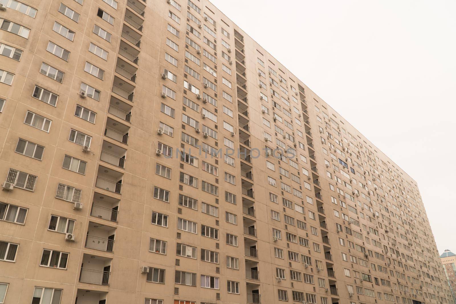 Facade of a modern multi storey residential complex. Urban architecture