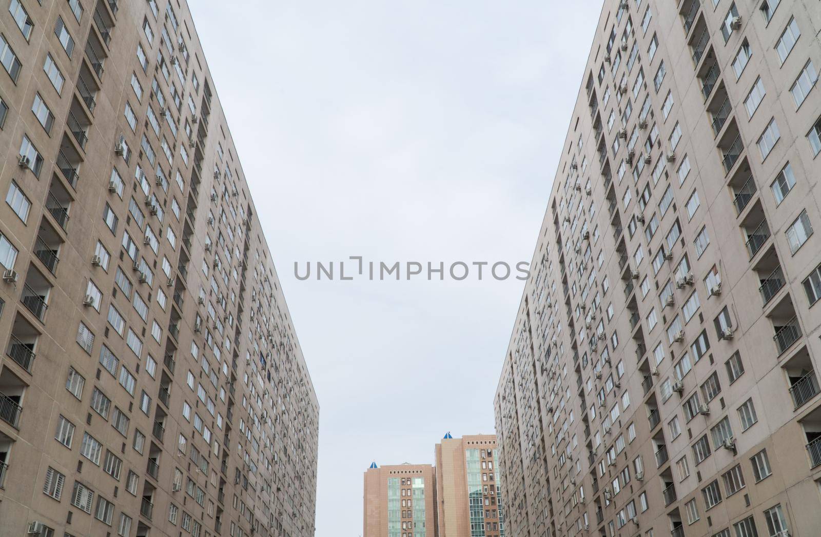 Facade of a modern multi storey residential complex. Urban architecture