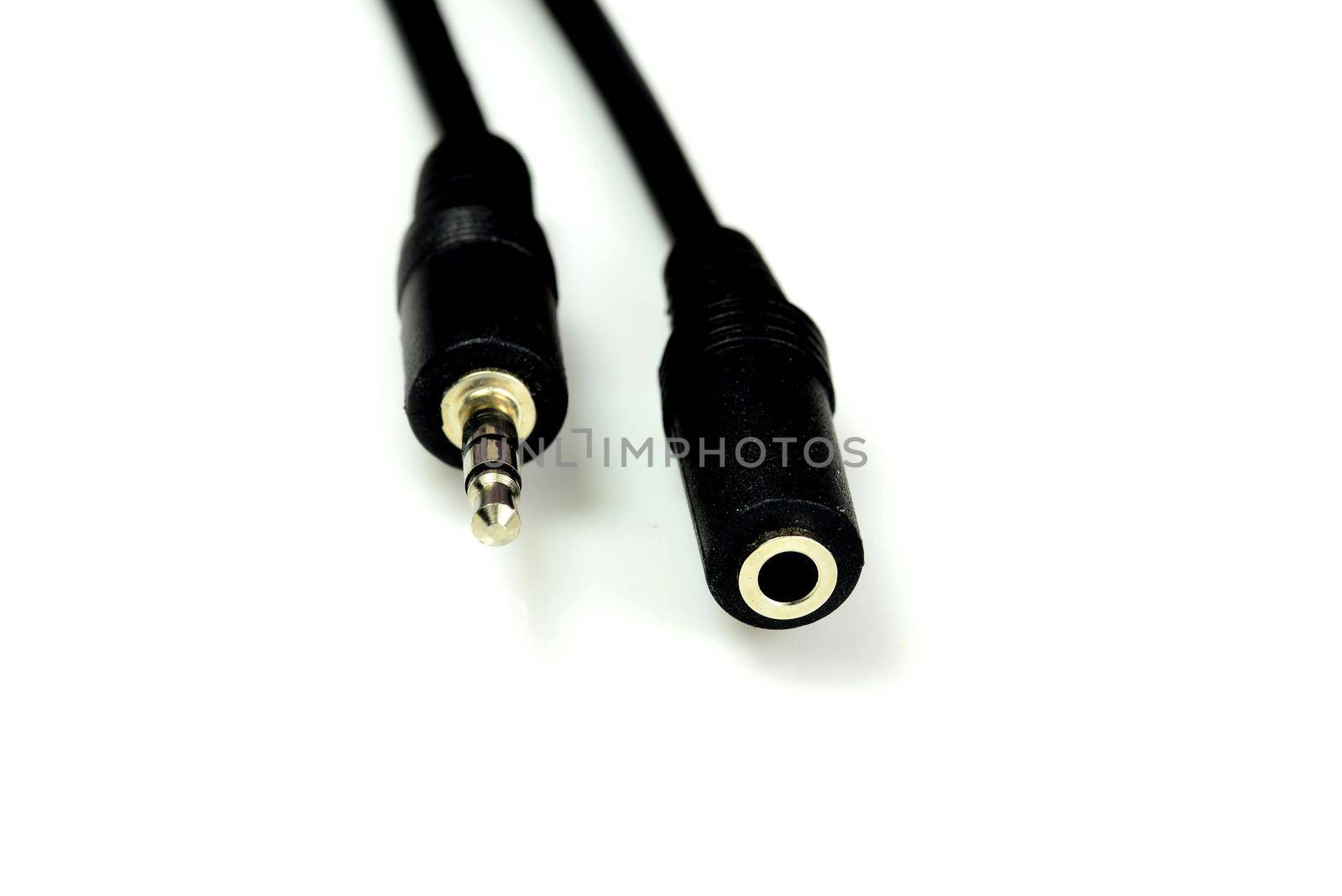 phone jack in a closeup with coupling for extension cable by Jochen