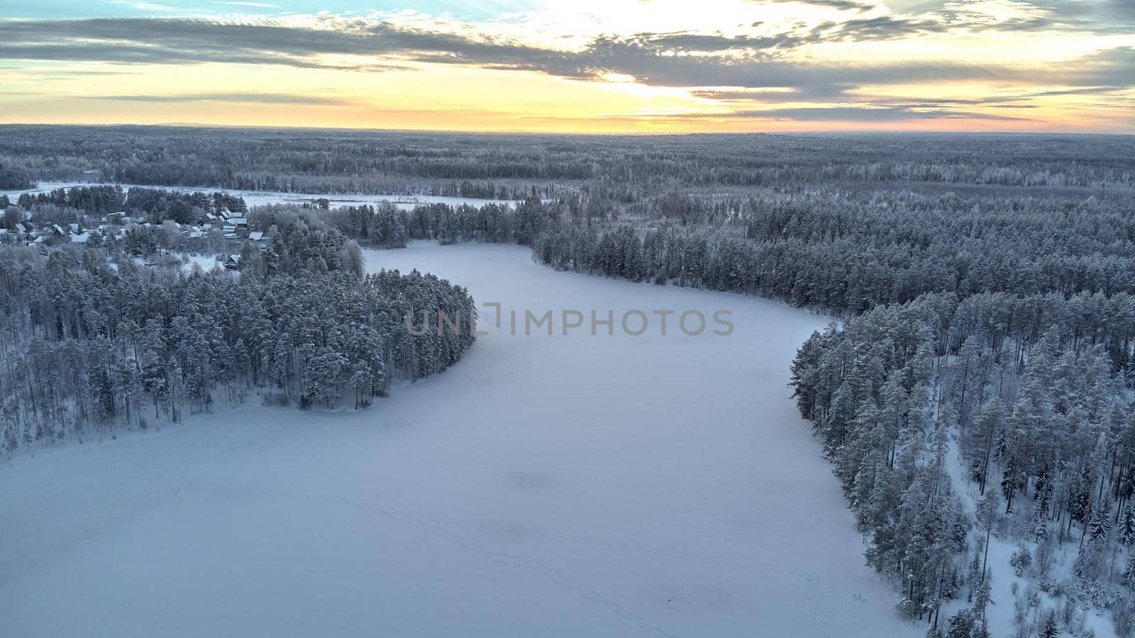 Beautiful winter sky and frozen lake in Russia. High quality photo