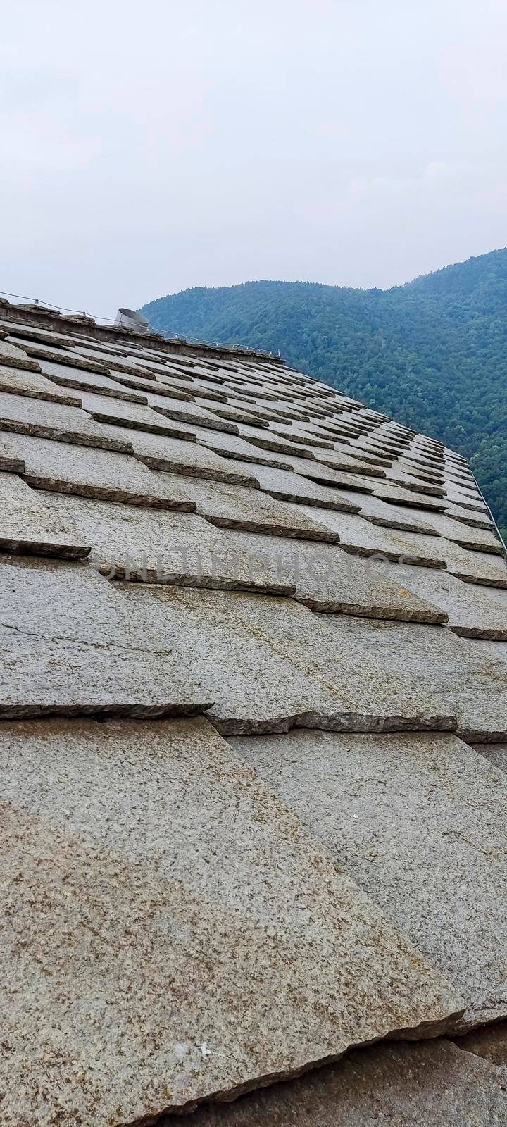 traditional roof of the Alpi piode beole made with Gneiss rock. High quality photo