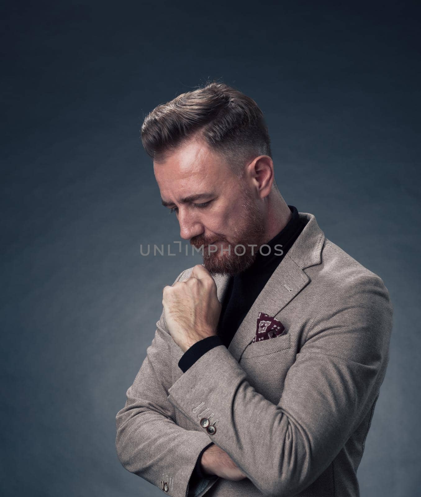 Frustrated middle aged elegant man Close up face of a stressed businessman wearing a stylish suit with eyes closed. Side shot by dotshock