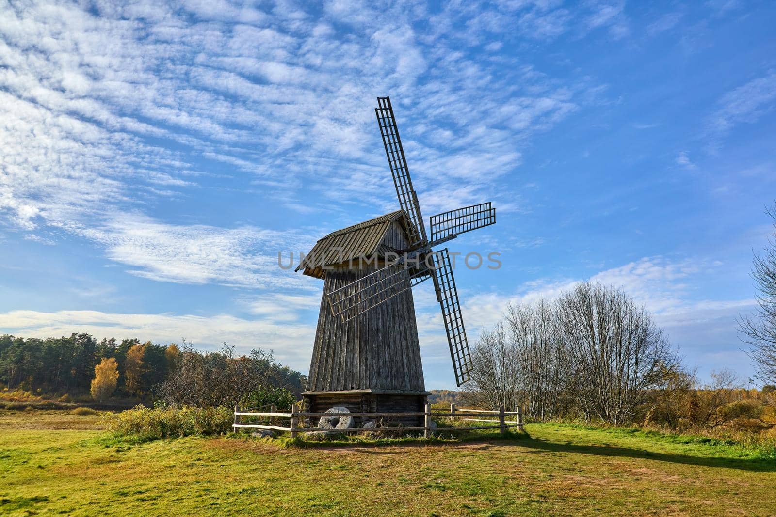 Awesome windmill standing in the field. High quality photo