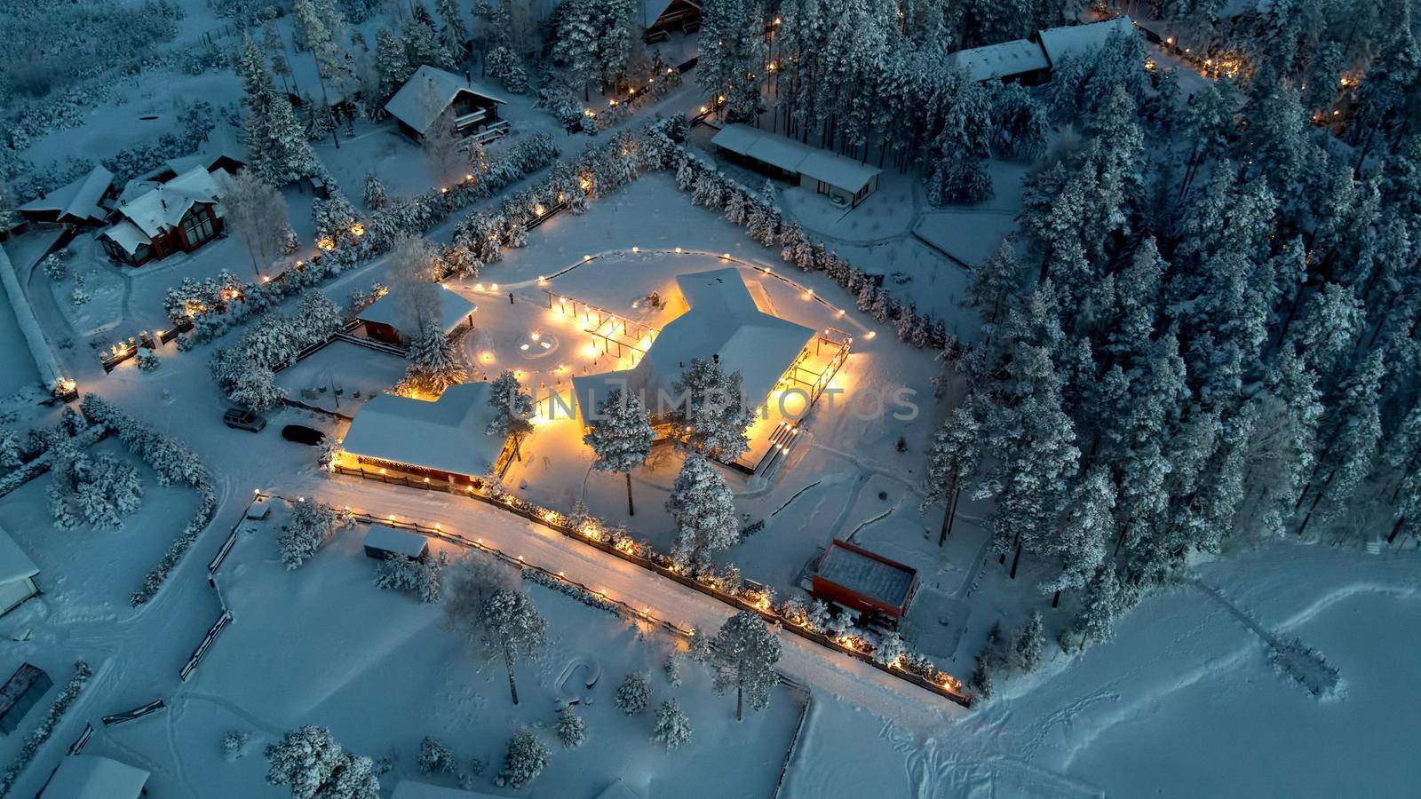 Stunning lights of winter house from drone. High quality photo