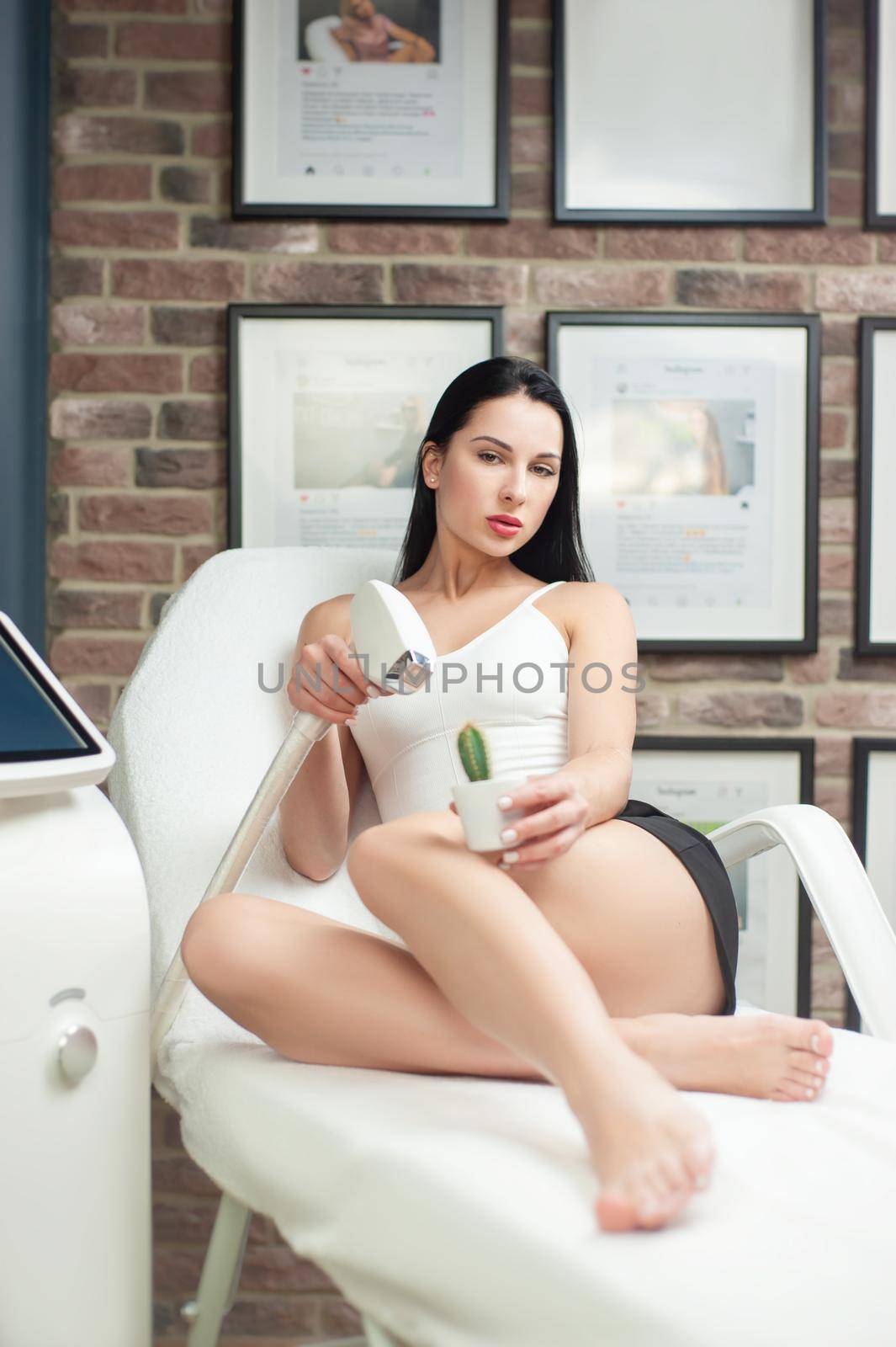 a woman in a laser hair removal studio with a cactus in her hand as a symbol of unwanted hair growth by Rotozey