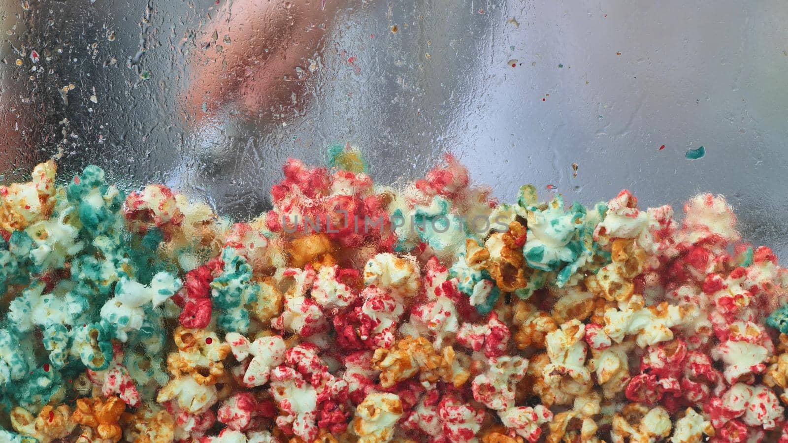 Colored and delicious fried popcorn on the street