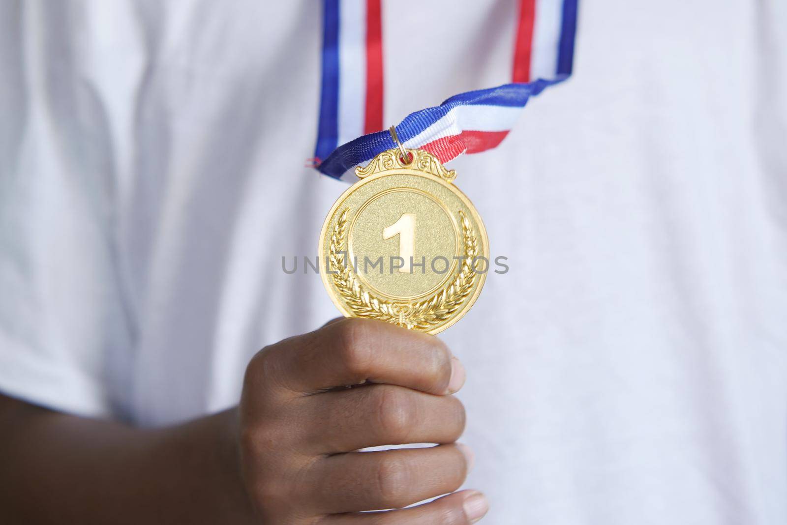 First Place Throphy against yellow background.