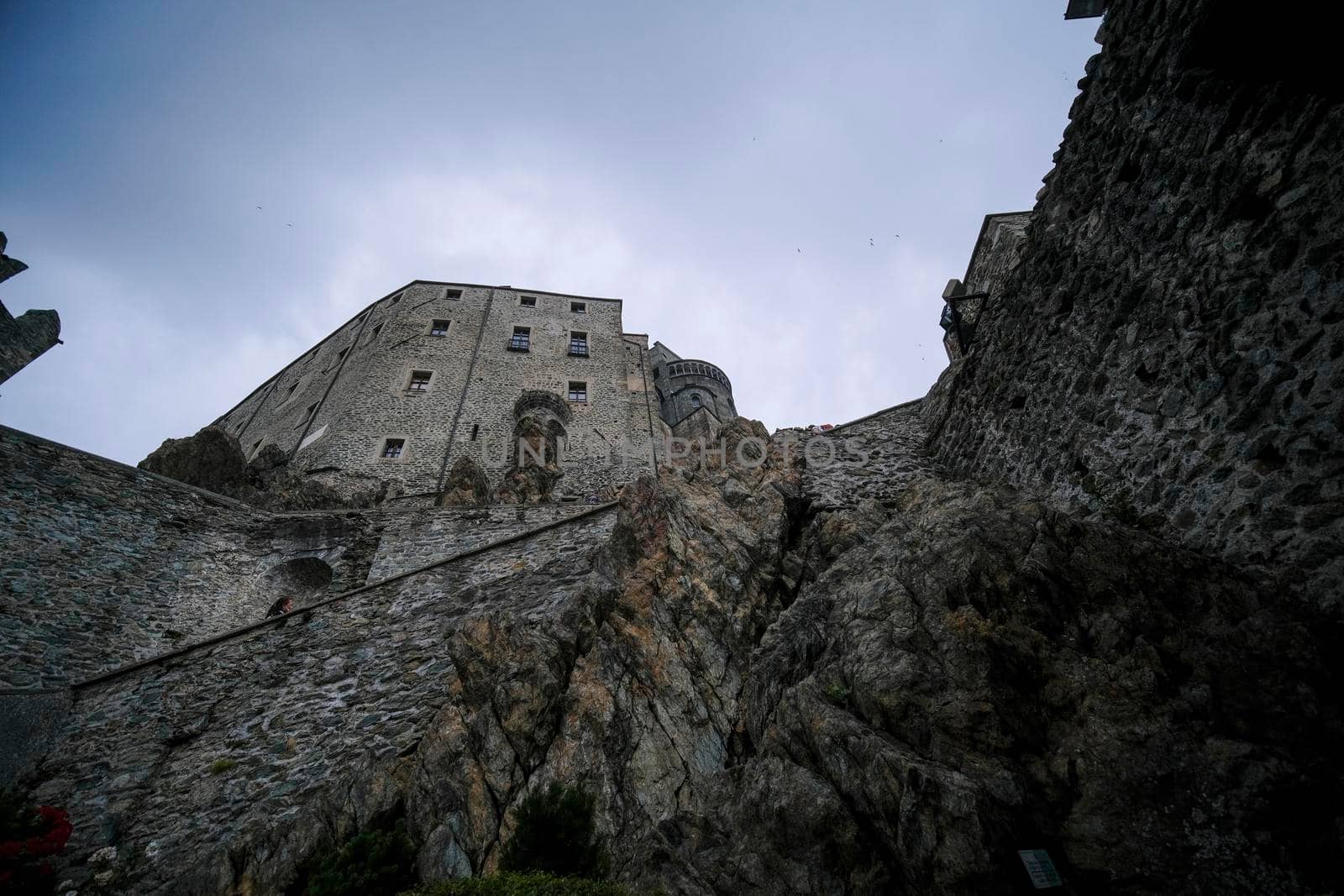 Sacra di San Michele in Turin, view from below of the cliff and walls. High quality photo