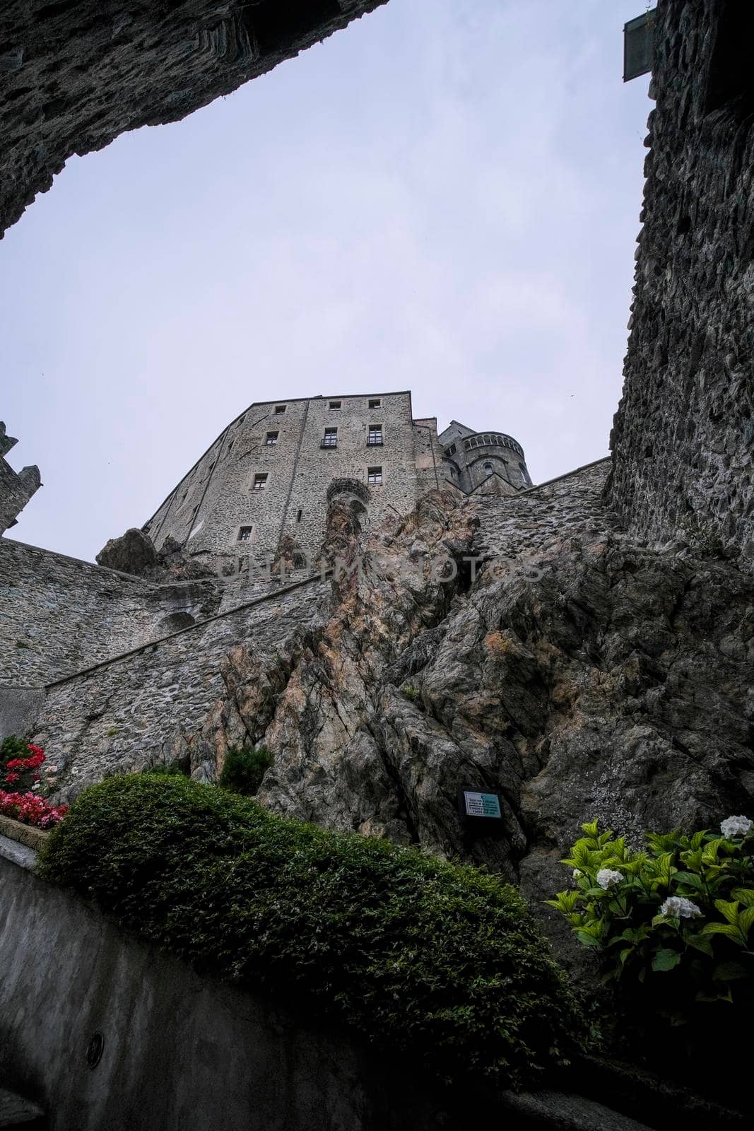 Sacra di San Michele in Turin, view from below of the cliff and walls. High quality photo