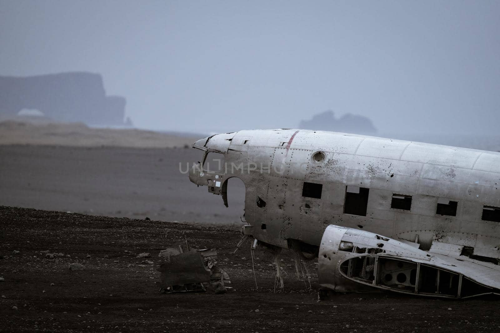 Wreck of and airplane profile, foggy day by FerradalFCG