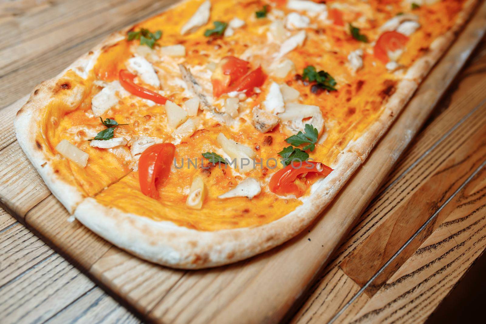 Pizza on wooden table top view. Fast food. Post blog social media. with copy space. Pizza ready to eat by UcheaD