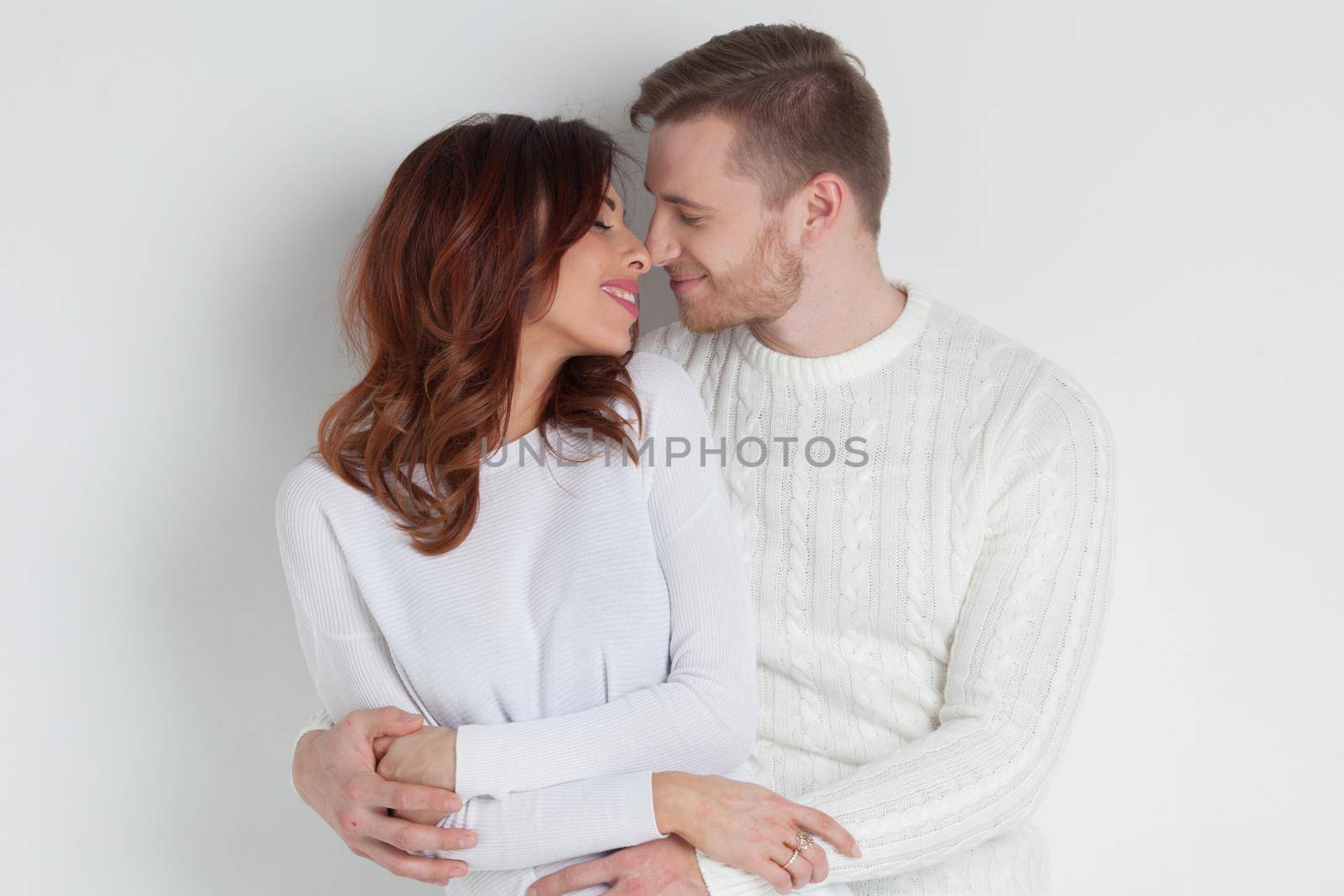 Happy couple ib white hugging by Yellowj