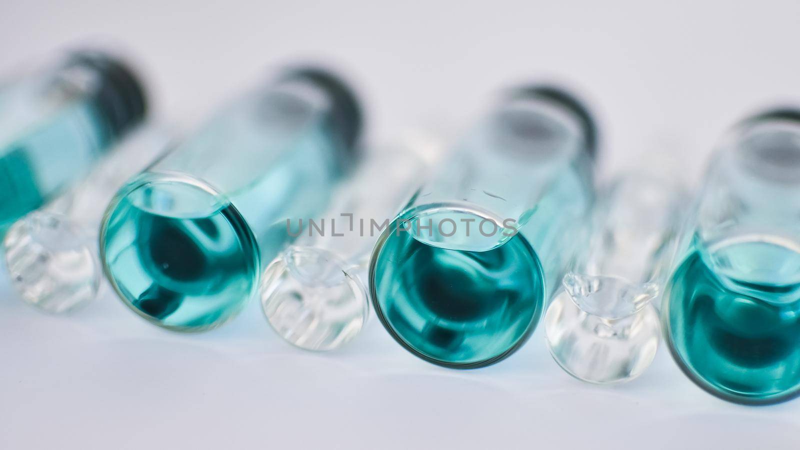 Medical ampoules for injection isolated on white background. Medicines and disease treatment, pharmacology and science concepts