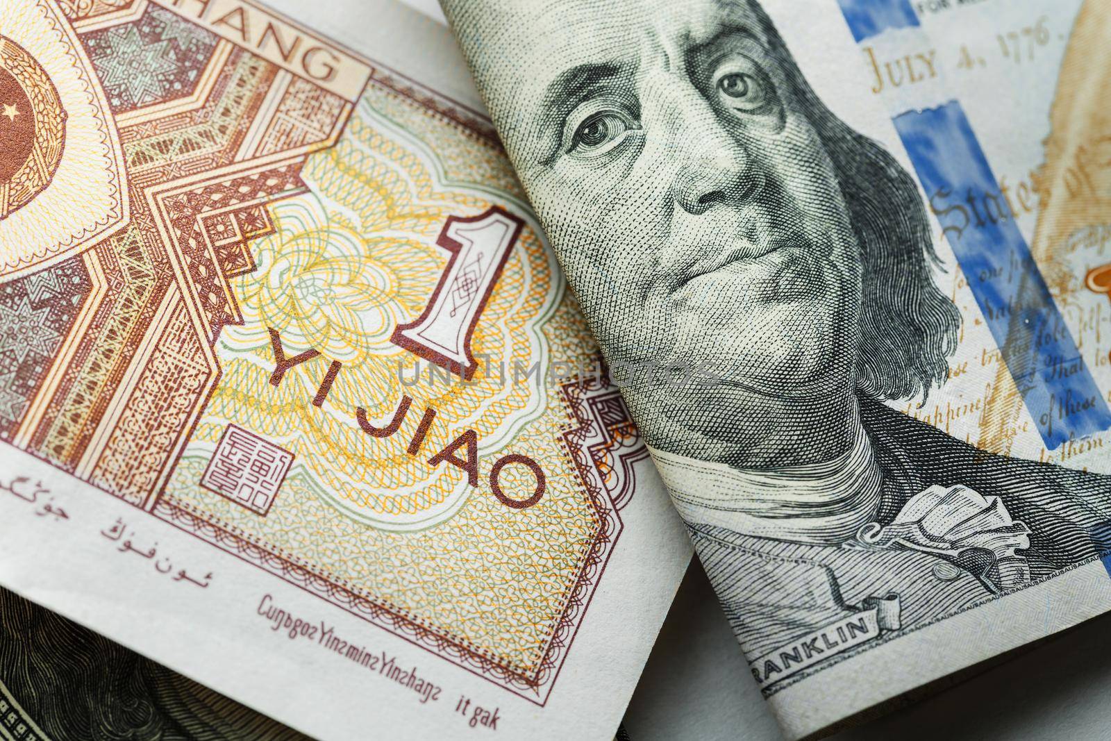 One Chinese yuan banknote onto various us dollar usa