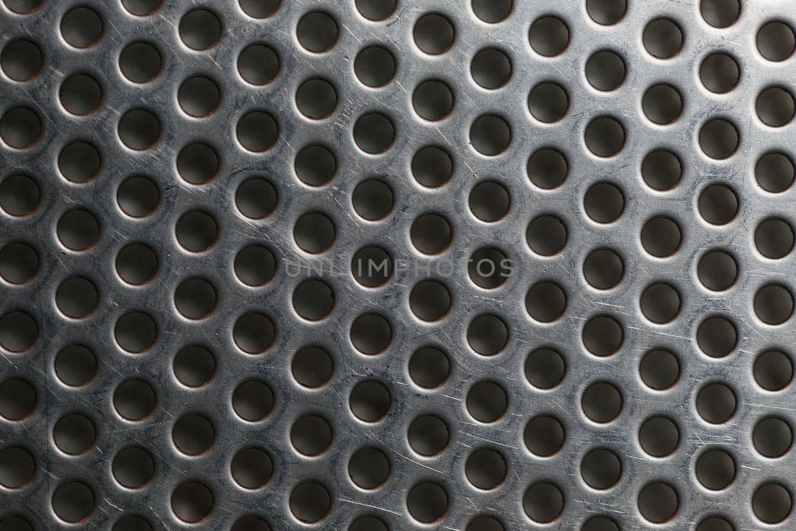 Silver metal shaped like a honeycomb for design background, texture