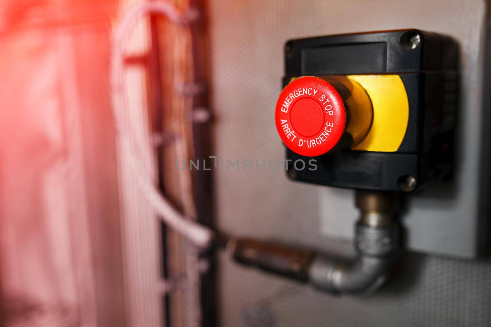 The red emergency button or stop button for Hand press. STOP Button for industrial machine, Emergency Stop.