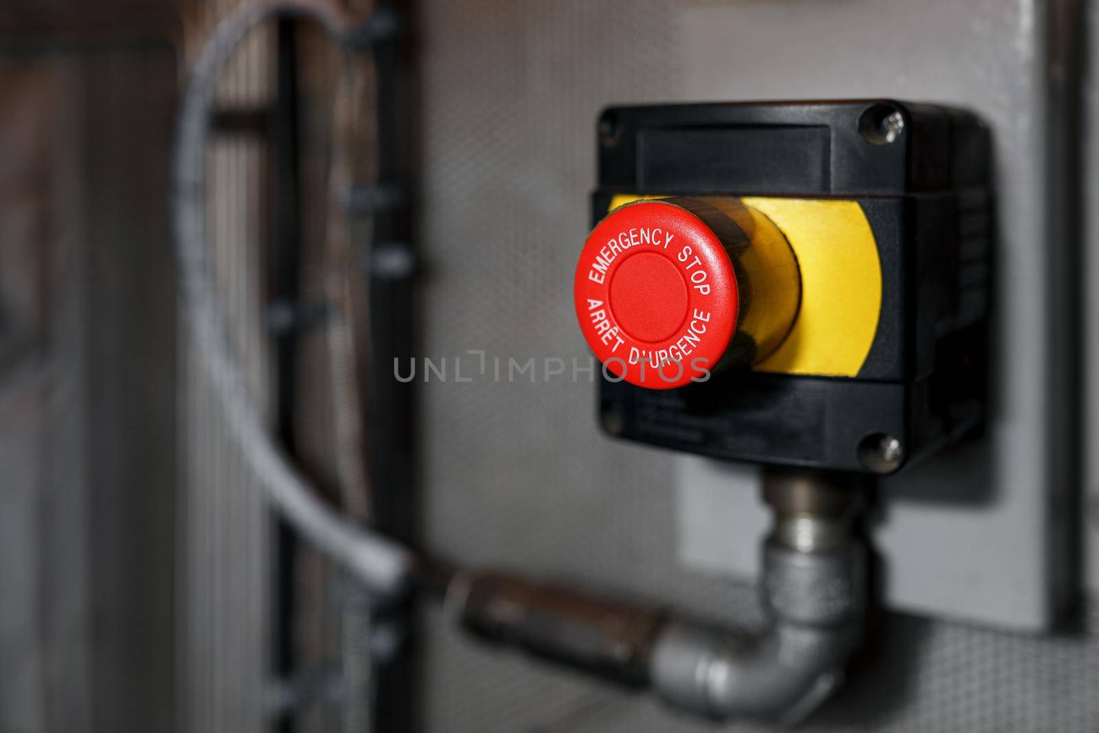 The red emergency button or stop button for Hand press. STOP Button for industrial machine, Emergency Stop for Safety. by AlexGrec