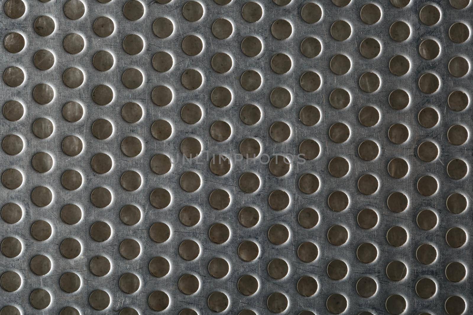 Silver metal shaped like a honeycomb for design background, texture