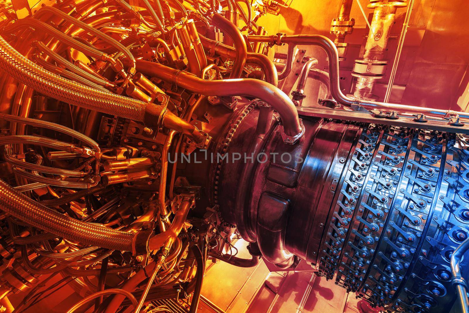 Gas turbine engine located inside the aircraft. Clean energy in a power plant used on an offshore oil and gas refining central platform. Oil gas, ecology and clean energy concept. Power and takeoff