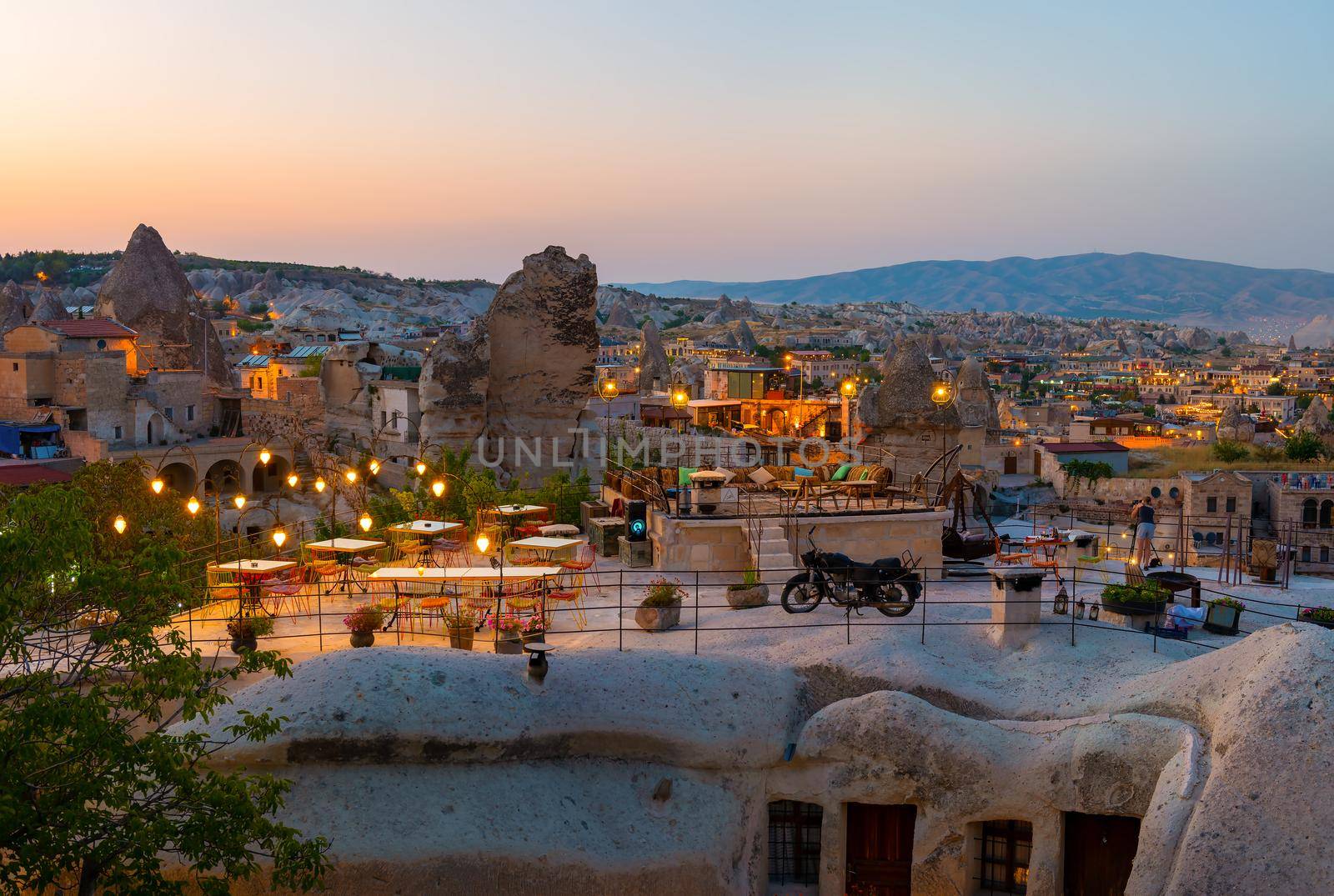 Goreme town on sunset by Givaga